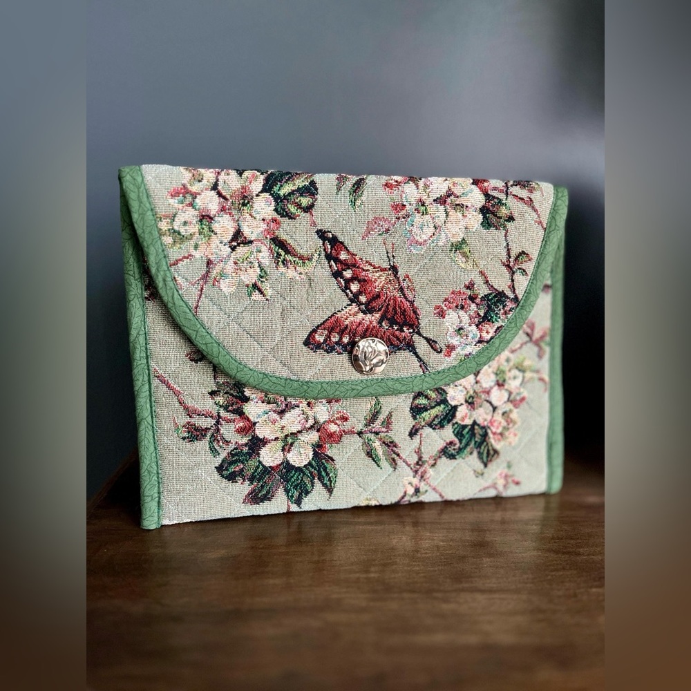Quilted butterfly tapestry clutch, handcrafted from secondhand textiles